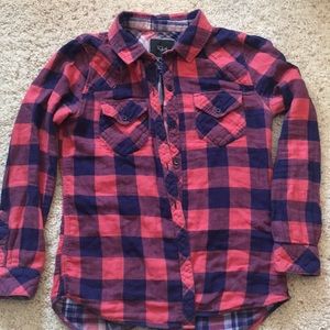 Woman’s plaid button up
